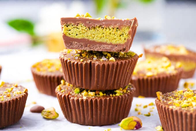 A stack of Dubai chocolate pistachio cups.