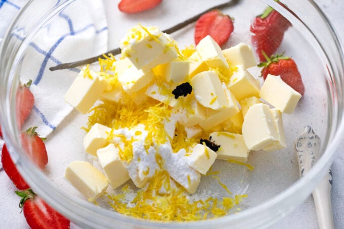 Whipped strawberry butter ingredients in a bowl.
