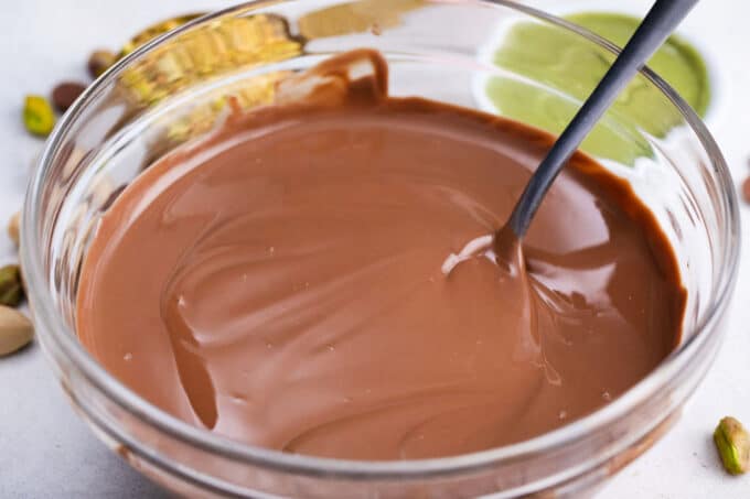 A bowl of melted chocolate.