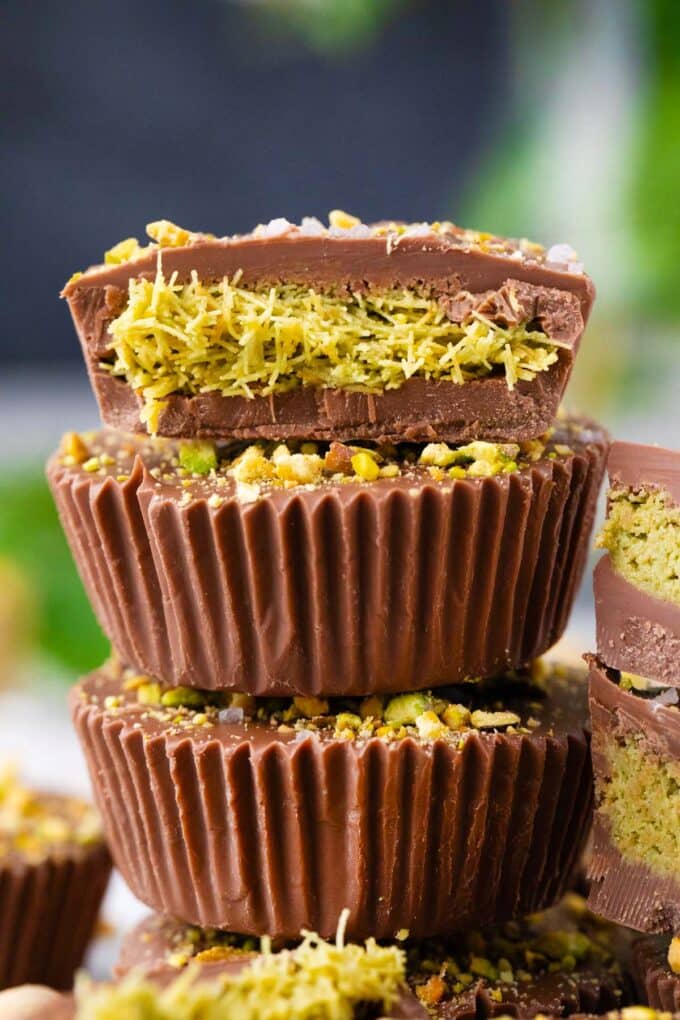 Stacked Dubai chocolate pistachio cups.