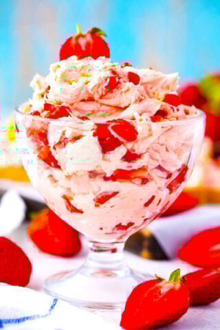Whipped strawberry butter in an ice cream bowl.