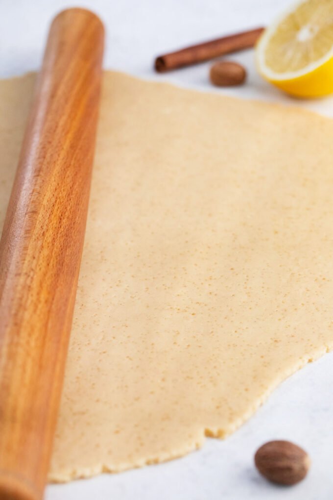 Rolling dough for apple tart.