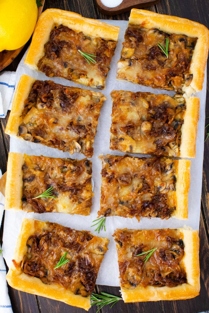 Overhead shot of cheesy caramelized onion tart.