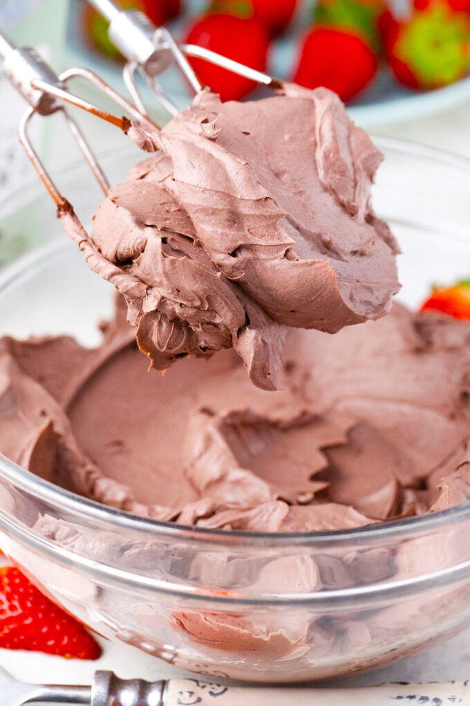 Chocolate whipped cream on beaters.