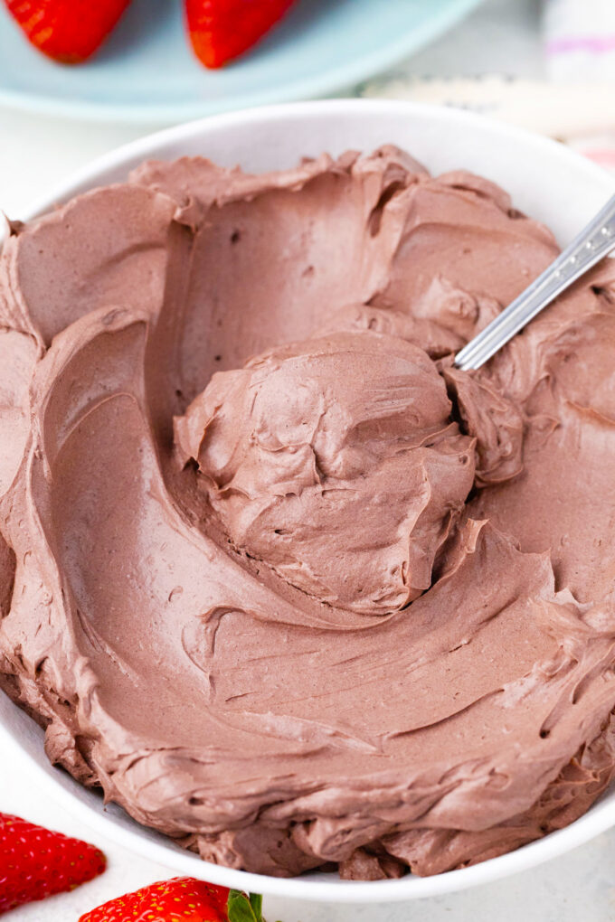 A spoonful of chocolate whipped cream.