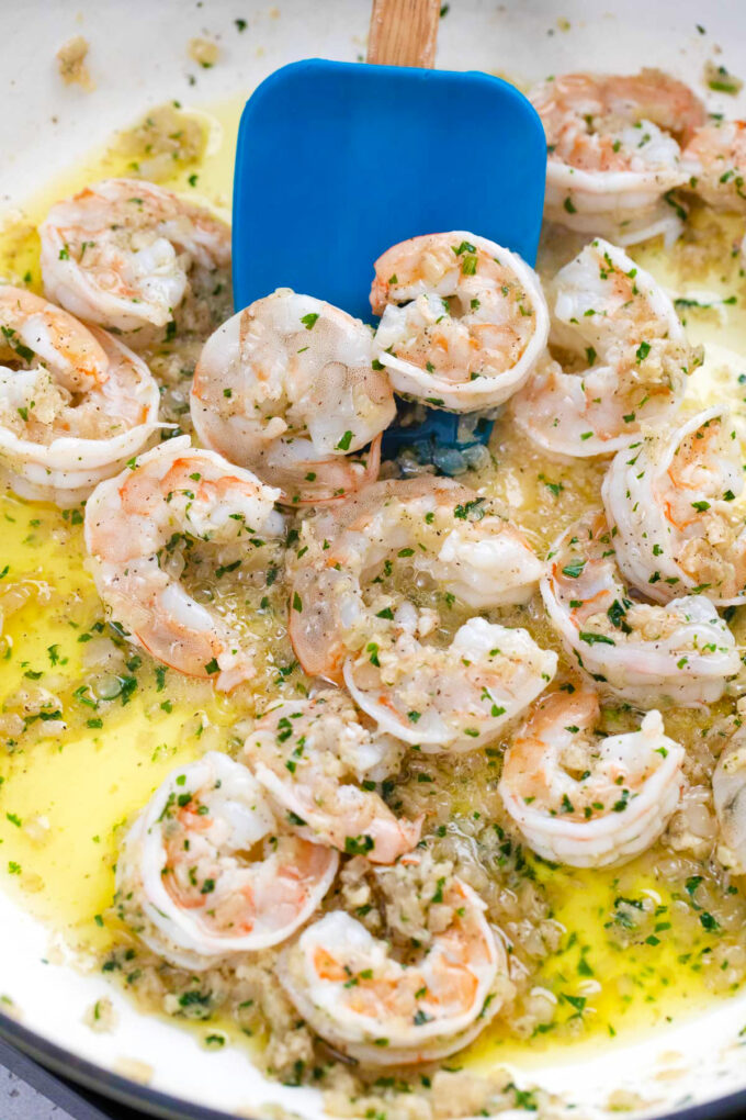 Cooking shrimp in garlic butter.