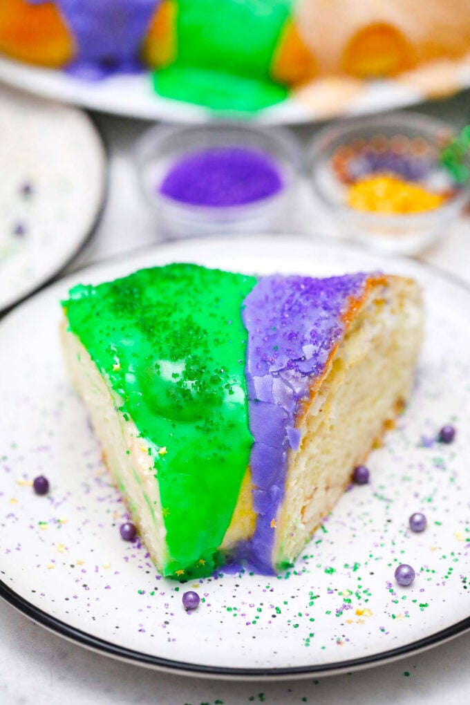 A colorful slice of Mardi Gras King cake.