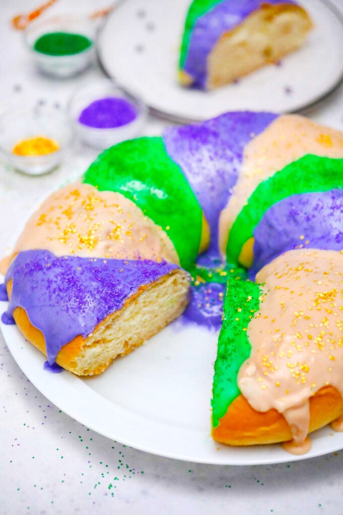 Sliced Mardi Gras King cake.
