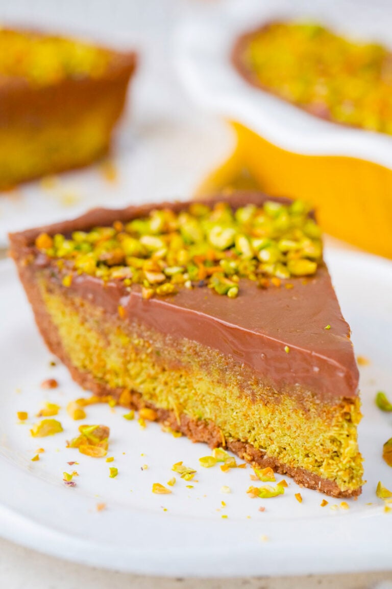 Creamy Dubai chocolate tart with pistachio kataif filling.