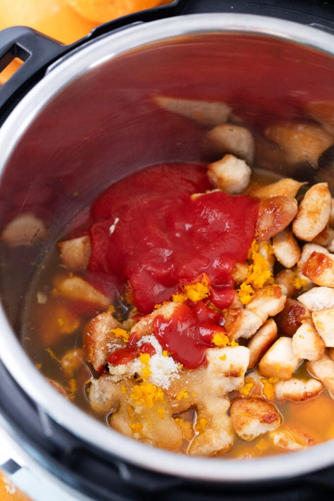 Instant Pot Orange Chicken ingredients in the inner pot.