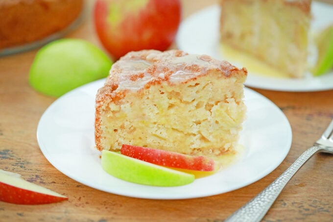 Irish apple cake with sliced apples and custard.