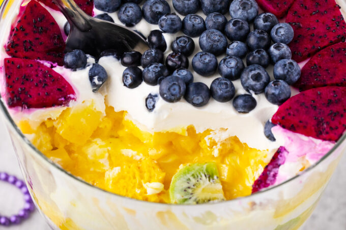 Mardi Gras trifle with lemon curd and fruits.
