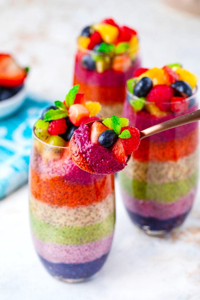 A spoonful of creamy rainbow chia pudding parfait.