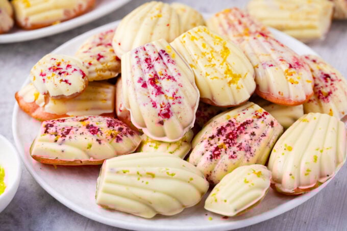 Homemade strawberry madeleines with lemon zest.