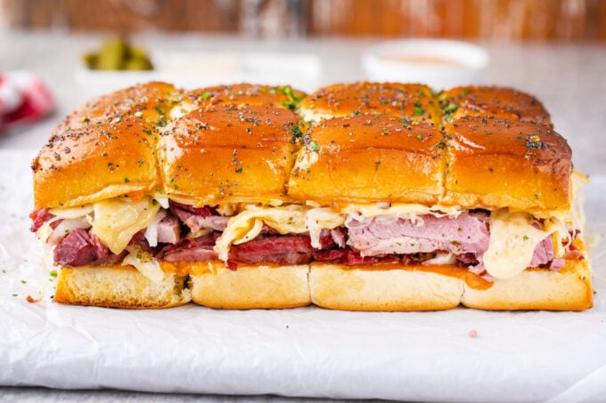 Homemade Reuben sliders ready to be baked.