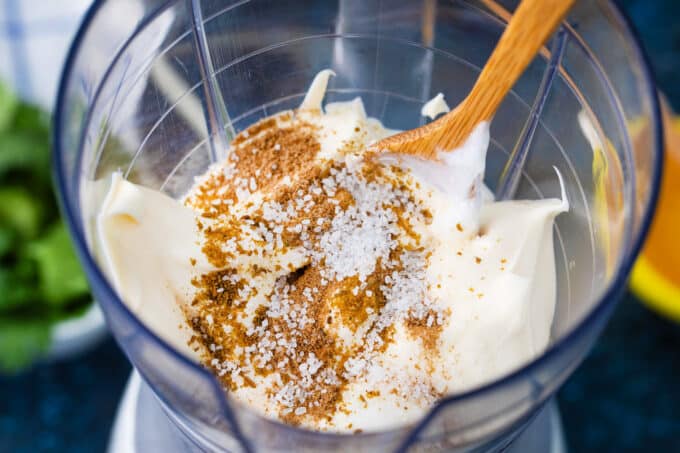 Creamy chipotle sauce ingredients in a blender.