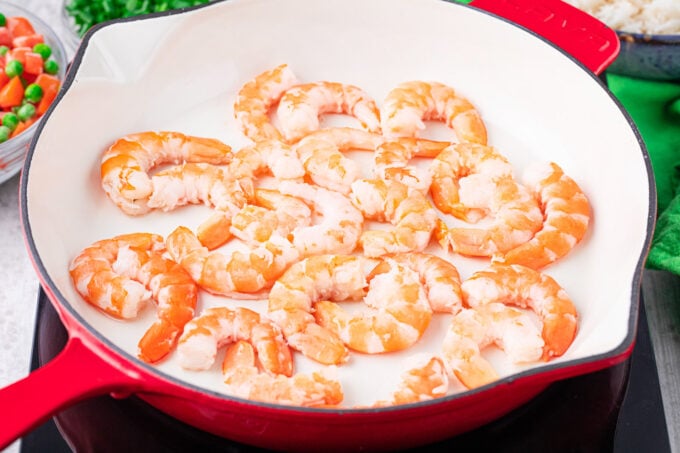 Cooking shrimp in a pan.
