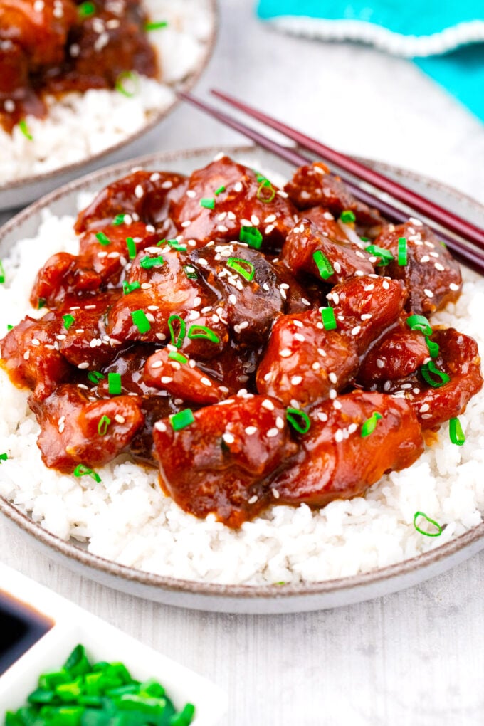 Homemade slow cooker sesame chicken over rice.
