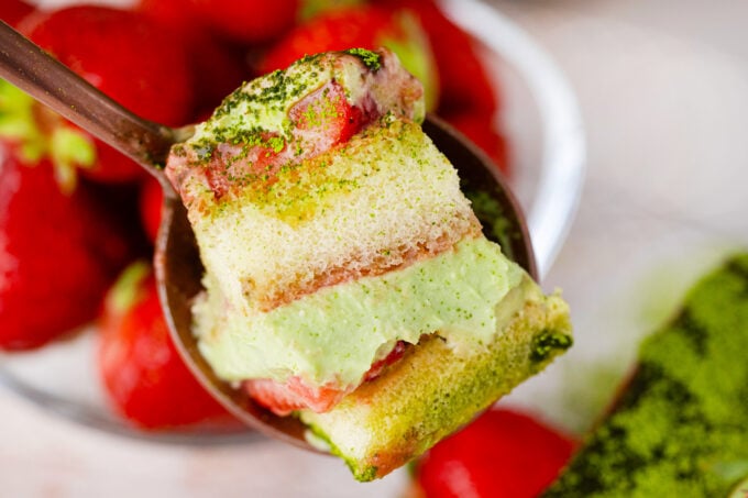 A forkful of matcha strawberry tiramisu.