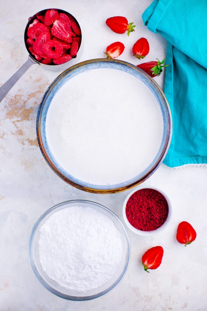 Overhead shot of strawberry whipped cream recipe ingredients.